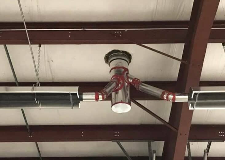 Shown here is the common flue pipe between two tube heaters.