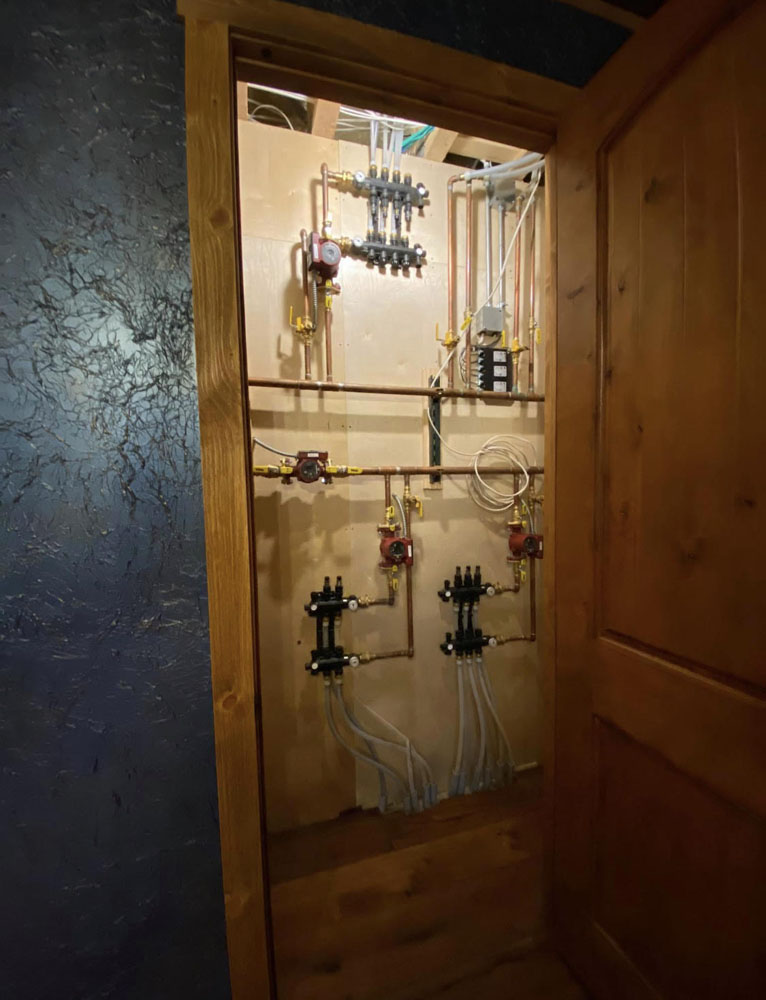 Pumps and manifold hidden in a closet, for one end of the home.