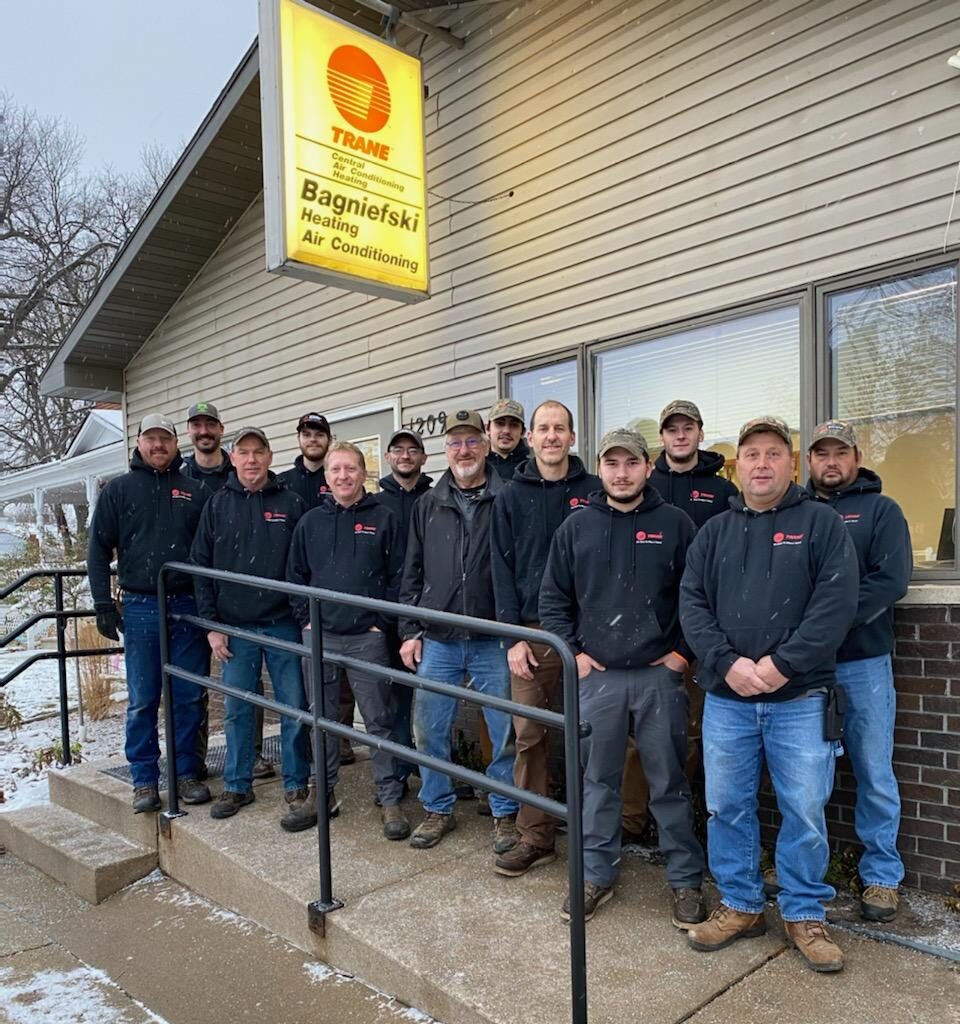 Group photo of staff in front of Bagniefski Heating and Air Conditioning